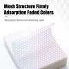 A close-up view of colour catcher sheets featuring a hexagonal mesh structure, demonstrating their strong dye absorption technology. The design highlights the adsorption of faded colours and fluorescent whitening agents for cleaner, brighter laundry.